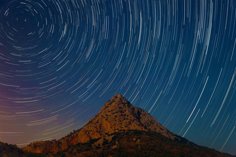 Long exposure photography of stars in night sky symbolizing circadian rhythm, natural cycles, and Nutreska sleep science